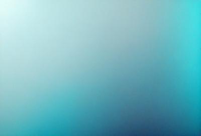 The primary subject of the image is a large, empty, and dark blue space. The setting is a vast, open area with no visible objects or landmarks. The visual style is a close-up of the blue background, which gives the impression of a deep, dark ocean. The colors and mood of the image are predominantly dark and moody, with the blue hue creating a sense of depth and mystery.