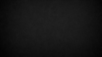 The primary subject of the image is a black background. The setting is a dark, empty space with no visible objects or elements. The visual style is a simple, monochromatic design. The colors and mood are predominantly dark and moody, creating a sense of mystery or drama.