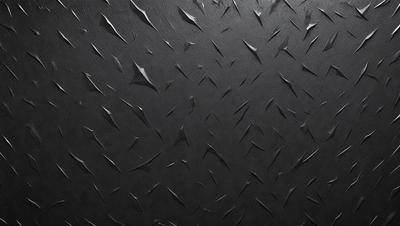 The primary subject of the image is a black leather wall with a pattern of white spikes. The setting is a dark room, and the visual style is a close-up of the leather wall. The dominant colors are black and white, creating a bold and striking appearance.