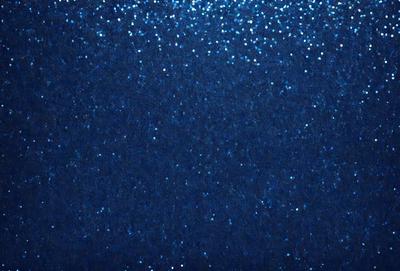 The primary subject of the image is a blue background with a pattern of blue stars. The setting is a dark blue sky, and the visual style is a digital art or illustration. The colors and mood of the image are predominantly dark blue and starry, creating a sense of depth and mystery.