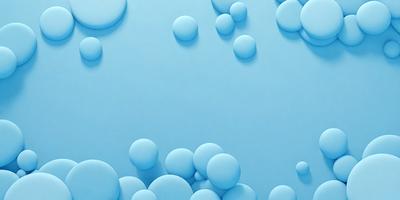 The primary subject of the image is a blue background with numerous blue spheres scattered across it. The setting appears to be a wall or a surface with a blue tint. The visual style of the image is a combination of a photo and digital art, as the spheres are arranged in a pattern that gives the impression of a digital design. The colors and mood of the image are predominantly blue, creating a calm and serene atmosphere.