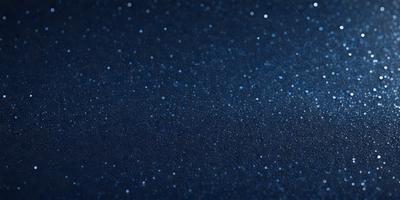 The primary subject of the image is a blue sky filled with bright, shining stars. The setting is a dark, starry night, with the stars being the main focus of the image. The visual style is a photo of the night sky, capturing the beauty of the stars and the darkness of the night. The colors and mood of the image are predominantly dark and serene, with the bright stars providing a contrasting and captivating element.