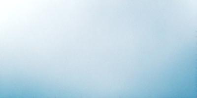 The primary subject of the image is a large, empty, and blue sky. The setting is a vast, open space with no visible landmarks or objects. The visual style is a natural, outdoor scene with a focus on the sky. The colors and mood are predominantly blue, creating a calm and serene atmosphere.