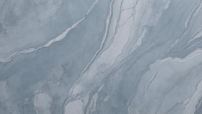 The primary subject of the image is a marble-like surface with a blue and white color scheme. The setting is a wall, and the visual style appears to be a photo. The colors and mood of the image are predominantly blue and white, creating a clean and elegant atmosphere.
