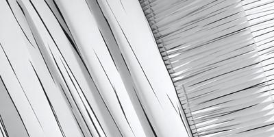 The primary subject of the image is a white curtain. The setting is a room with a white wall, and the visual style is a close-up of the curtain. The curtain appears to be made of a metallic material, giving it a shiny and reflective appearance. The colors and mood of the image are predominantly white, creating a clean and minimalist atmosphere.