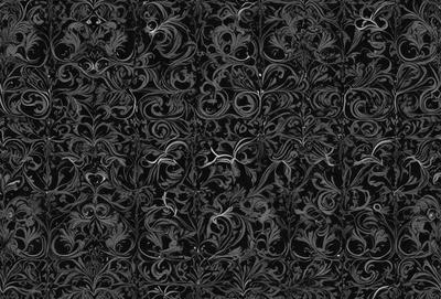 The primary subject of the image is a black and white patterned design, which appears to be a decorative wallpaper or a black and white floral print. The setting is a wall, and the visual style is a black and white photograph. The colors and mood of the image are predominantly black and white, creating a classic and elegant atmosphere.