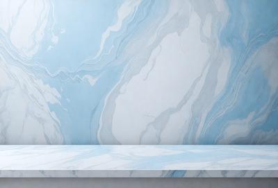 The primary subject of the image is a marble countertop with a blue and white marble pattern. The setting is a bathroom, with the countertop being the main focus of the scene. The visual style is a photo, capturing the intricate details of the marble countertop. The colors and mood of the image are predominantly blue and white, creating a clean and elegant atmosphere.