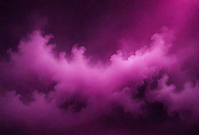 The primary subject of the image is a purple cloud, which is the main object, scene, or focus of the image. The setting or background is a dark sky, and the visual style appears to be a photo. The dominant colors in the image are purple and pink, creating a moody and dramatic atmosphere.