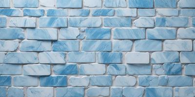The primary subject of the image is a blue brick wall with a pattern of blue and white tiles. The setting is a room with a blue brick wall as the main focus. The visual style is a close-up of the blue brick wall, showcasing the intricate pattern of the tiles. The colors and mood of the image are predominantly blue, creating a calm and serene atmosphere.