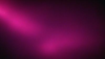The primary subject of the image is a pink background. The setting is a dark room, and the visual style appears to be a digital art or illustration. The dominant colors in the image are pink, creating a warm and inviting atmosphere.