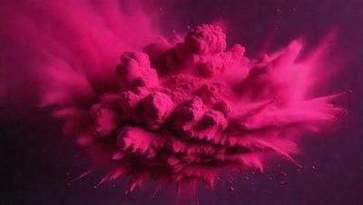 The primary subject of the image is a large, pink, swirling mass of paint or a purple cloud. The setting appears to be a dark background, which contrasts with the vibrant pink or purple color of the swirling mass. The visual style of the image is a close-up of the swirling mass, which gives a sense of depth and movement. The colors and mood of the image are predominantly pink or purple, creating a sense of energy and dynamism.