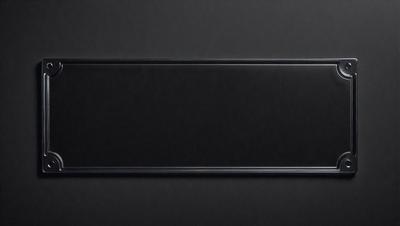 The primary subject of the image is a black leather surface. The setting is a dark room, and the visual style is a close-up of the leather surface. The colors and mood of the image are predominantly dark and moody, with the black leather serving as the focal point.