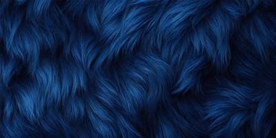 The primary subject of the image is a blue, furry fabric. The setting is a close-up of the fabric, showcasing its texture and color. The visual style is a detailed, up-close view of the fabric. The dominant colors are blue and purple, creating a calm and soothing atmosphere.