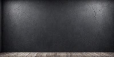 The primary subject of the image is a large, empty wall with a grey background. The setting is a room with a wooden floor. The visual style is a photo, and the dominant colors are grey and black. The overall atmosphere is minimalistic and empty.