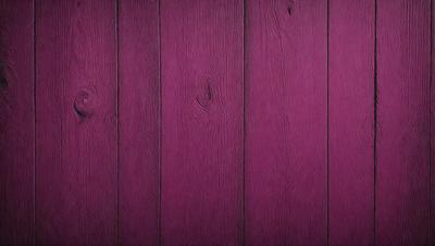 The primary subject of the image is a wooden wall with a purple color. The setting is a room with a wooden surface, and the visual style is a close-up of the wooden wall. The dominant colors are purple and brown, creating a warm and cozy atmosphere.