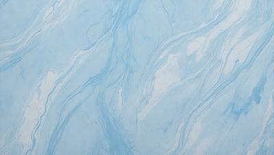 The primary subject of the image is a blue and white marbled wall. The setting is a room with a blue and white marbled wall as the main focus. The visual style is a photo of the marbled wall. The dominant colors are blue and white, creating a calm and soothing atmosphere.