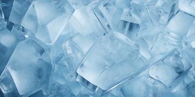The primary subject of the image is a large, clear, and blue ice cube. The setting is a blue background, which creates a striking contrast with the ice cube. The visual style is a close-up of the ice cube, showcasing its unique texture and color. The dominant colors are blue and white, giving the image a cool and refreshing mood.