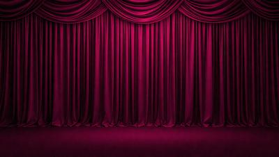 The primary subject of the image is a purple curtain, which is the main object, scene, or focus of the image. The setting is a stage, with the curtains hanging down, creating a dramatic backdrop. The visual style is a photo, capturing the purple curtains in their natural environment. The colors and mood of the image are predominantly purple, creating a sense of drama and sophistication.