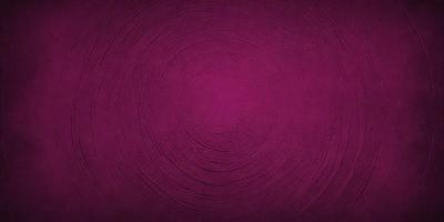 The primary subject of the image is a purple circular pattern. The setting is a purple background, which creates a visually striking contrast with the circular pattern. The visual style appears to be a combination of a photo and a digital art or illustration, as the purple circular pattern is the main focus of the image. The colors and mood of the image are predominantly purple, giving it a calm and serene atmosphere.