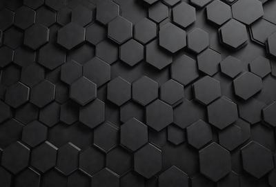 The primary subject of the image is a black and white patterned surface, which appears to be a wall or a floor. The setting is a dark room, and the visual style is a close-up of the pattern. The dominant colors are black and white, and the overall atmosphere is somewhat mysterious and intriguing.