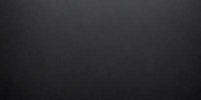 The primary subject of the image is a black leather surface. The setting is a dark room, and the visual style is a close-up of the leather surface. The colors and mood of the image are predominantly dark and moody, with the black leather serving as the main focal point.
