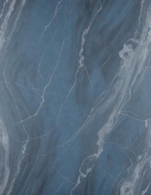 The primary subject of the image is a blue marble wall with a pattern of swirls and lines. The setting is a room with a blue-gray color scheme. The visual style is a close-up of the marble wall, showcasing its unique texture and design. The colors and mood of the image are predominantly blue and gray, creating a calm and sophisticated atmosphere.