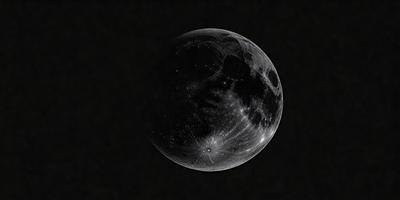 The primary subject of the image is a close-up of a moon, which is the main object in the scene. The moon is shown in a dark, black and white setting, giving it a dramatic and moody appearance. The visual style of the image is a combination of photo and digital art, creating a unique and artistic representation of the moon. The colors and mood of the image are predominantly dark and mysterious, emphasizing the moon's silhouette and the night sky.