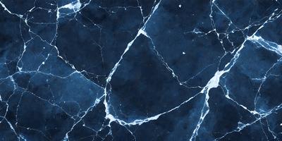 The primary subject of the image is a blue and white marble-like surface, which appears to be a wall or a piece of art. The setting is a dark room, and the visual style is a close-up of the marble surface. The colors and mood of the image are predominantly dark and moody, with the blue and white marble providing a contrasting and elegant touch.
