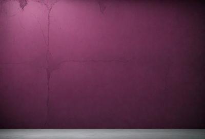 The primary subject of the image is a purple wall with a damaged texture. The setting is a room with a concrete floor. The visual style is a photo, and the dominant colors are purple and pink. The overall atmosphere is somewhat moody and dramatic.