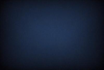 The primary subject of the image is a dark blue sky. The setting is a vast, open space with no visible landmarks or objects. The visual style is a simple, monochromatic image with no additional elements or textures. The colors and mood convey a sense of calmness and tranquility.