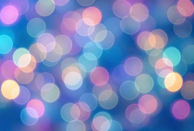 The primary subject of the image is a brightly colored, swirling pattern of lights, which creates a visually striking and vibrant scene. The setting is a blue background, which contrasts beautifully with the lights. The visual style of the image is a combination of digital art and illustration, as it appears to be a digital creation. The colors and mood of the image are predominantly blue and purple, giving it a calming and serene atmosphere.