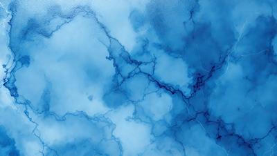 The primary subject of the image is a blue, cloudy sky with a few white clouds. The setting is an outdoor environment, with the sky serving as the backdrop. The visual style is a photo, capturing the natural beauty of the cloudy sky. The colors and mood of the image are predominantly blue and cloudy, creating a serene and peaceful atmosphere.