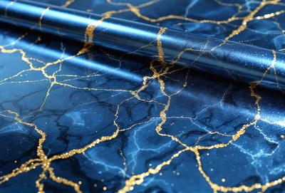 The primary subject of the image is a blue and gold fabric with a pattern of gold streaks. The setting is a table with the fabric laid out, and the visual style appears to be a combination of a photo and digital art. The colors and mood of the image are vibrant and lively, with the gold streaks adding a touch of elegance to the blue background.