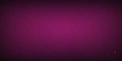 The image is a purple background with a single star visible in the middle of the frame. The star is the primary subject, and the purple background serves as the setting or background. The visual style appears to be a photo, and the colors and mood convey a sense of calmness and tranquility.