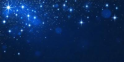 The primary subject of the image is a night sky filled with stars. The setting is a dark, star-filled sky, and the visual style is a photo. The colors and mood of the image are predominantly dark and serene, with the bright stars providing a contrasting element.