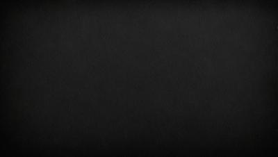 The primary subject of the image is a black background. The setting is a dark, empty space, with no visible objects or elements. The visual style is a simple, monochromatic design. The colors and mood are predominantly dark and moody, creating a sense of mystery or drama.