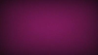 The primary subject of the image is a purple wall. The setting is a room with a purple background. The visual style is a close-up of the purple wall, which gives a sense of depth and texture. The colors and mood of the image are predominantly purple, creating a calm and serene atmosphere.