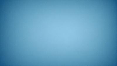 The primary subject of the image is a large, empty blue sky. The setting is a vast, open space with no visible landmarks or objects. The visual style is a simple, clean, and minimalist representation of the sky. The colors and mood are predominantly blue, creating a calm and serene atmosphere.
