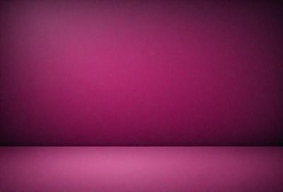 The primary subject of the image is a large, pink wall. The setting is a room with a purple background, which creates a striking contrast with the pink wall. The visual style is a close-up of the wall, emphasizing its color and texture. The dominant colors are pink and purple, creating a warm and inviting atmosphere.