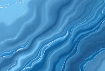 The primary subject of the image is a blue ocean with waves. The setting is the ocean, and the visual style is a photo. The dominant colors are blue and white, creating a calm and serene atmosphere.