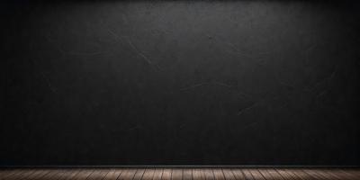 The primary subject of the image is a black wall with a wooden floor. The setting is a room with a black wall, and the visual style is a photo. The dominant colors are black and brown, creating a moody atmosphere.