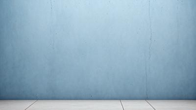 The primary subject of the image is a blue wall with a cement texture. The setting is a room with a white floor, and the visual style is a photo. The dominant colors are blue and white, creating a calm and serene atmosphere.