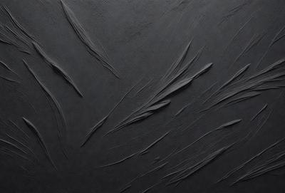 The primary subject of the image is a black background with a pattern of swirls and curves. The setting appears to be a dark room, and the visual style is a combination of a photo and a digital artwork. The dominant colors are black and grey, creating a moody atmosphere.