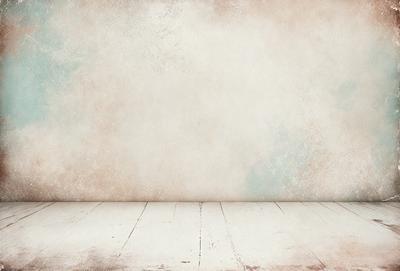The primary subject of the image is a white wall with a wooden floor. The setting is a room with a white wall and a wooden floor. The visual style is a photo, and the colors and mood are predominantly white, giving the image a clean and minimalist appearance.