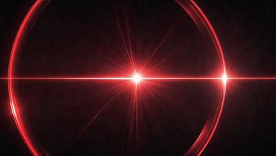 The primary subject of the image is a red light, which appears to be a bright light source. The setting is a dark background, which contrasts with the bright light. The visual style of the image is a close-up of the light source, creating a striking and dramatic effect. The colors and mood of the image are predominantly red, giving it a bold and intense appearance.