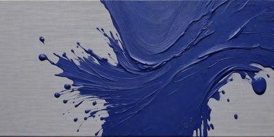 The primary subject of the image is a painting of a blue wave. The setting is a canvas, and the visual style is a painting. The dominant colors are blue and white, creating a calm and serene atmosphere.