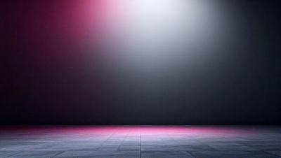 The primary subject of the image is a large, empty stage with a pink light illuminating the area. The stage appears to be a part of a theater or a performance venue. The setting is a black background, which contrasts with the pink light, creating a dramatic effect. The visual style of the image is a combination of a photo and digital art, as it captures the stage's emptiness and the pink light's glow. The colors and mood of the image are predomin