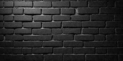 The primary subject of the image is a brick wall. The setting is a dark room, and the visual style is a black and white photo. The dominant colors are black and white, creating a moody atmosphere.