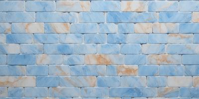 The primary subject of the image is a blue and white marble tile wall. The setting is a room with a blue and white marble tile wall as the main focus. The visual style is a close-up of the marble tile wall, showcasing its intricate design. The colors and mood of the image are predominantly blue and white, creating a clean and elegant atmosphere.