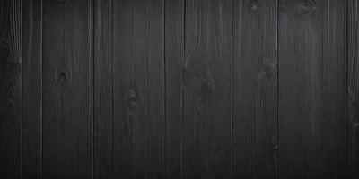 The primary subject of the image is a wooden wall with a black color. The setting is a room with a wooden floor. The visual style is a close-up of the wooden wall, showcasing its texture and details. The colors and mood of the image are dark and moody, creating a sense of depth and intrigue.